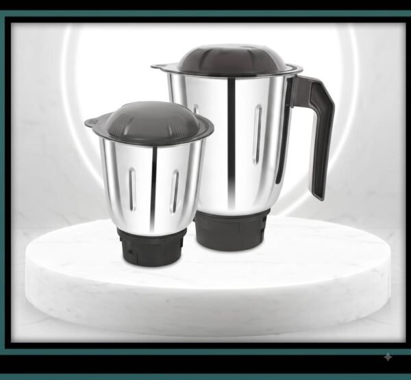 "Modern 2-jar mixer grinder kept on a clean kitchen marble countertop." "Compact mixer grinder with two stainless steel jars placed next to fresh herbs and spices."