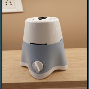 A crisp, close-up photograph of a compact electric mixer grinder base resting on a light-colored wooden countertop against a neutral beige wall. The appliance features a two-tone plastic body with a glossy white upper section and a matte, light-blue lower section that tapers down into a stable four-legged clover base with a white bottom trim.